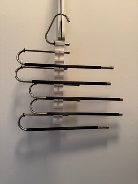 Lot of 3 hangers, 2 pant hangars and 1 scarf hanger.